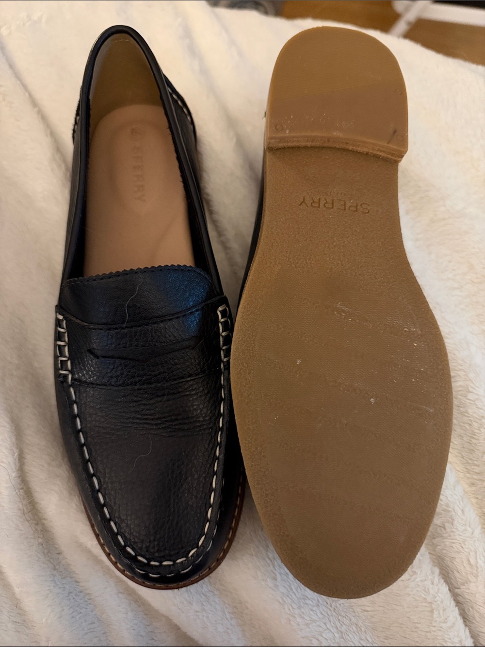 Sperry woman’s black Leather Penny Loafers with Tan Sole